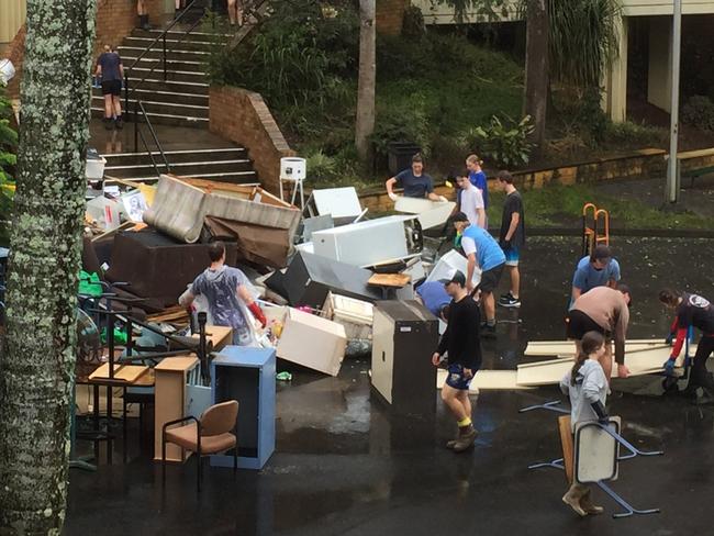 Flood clean up effort Trinity Catholic College, Lismore.