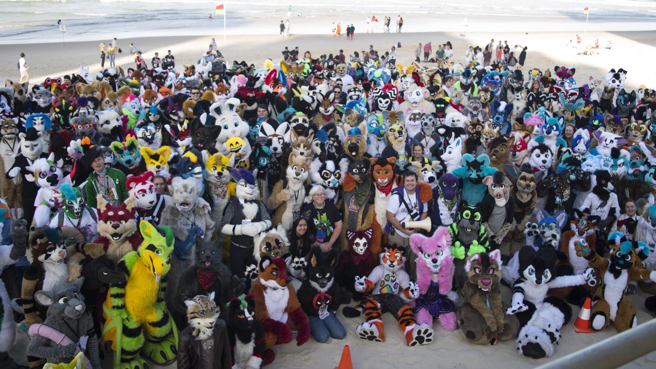 Christine Bradshaw, 54, is front and centre, without a fursuit, in a sea of furries at Furdu on the Gold Coast in 2018. Picture: Aaron Coffey