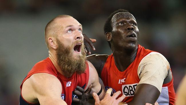 Max Gawn jostles with Aliir Aliir for position in a ruck contest on Friday. Picture: Michael Klein