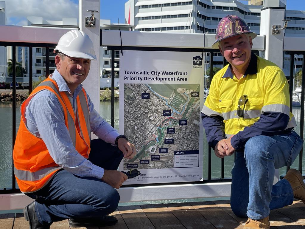 A change has been made to the Waterfront Promenade network map, next to Deputy Mayor Mark Molachino and Townsville MP Scott Stewart. Picture: Leighton Smith.