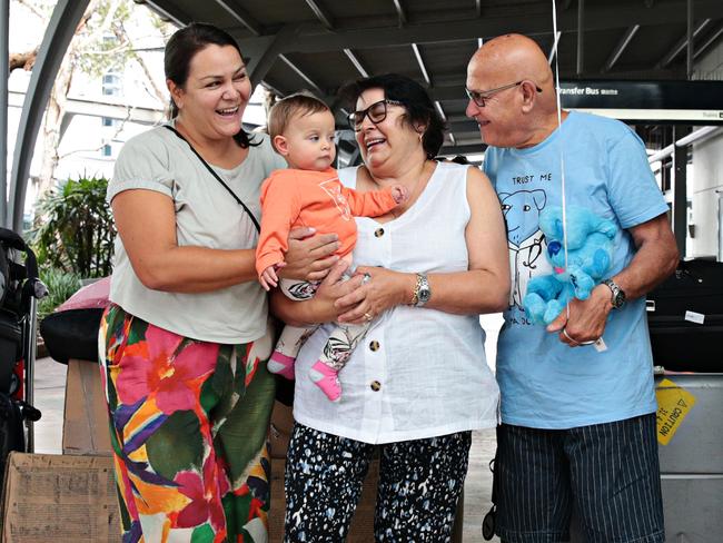 (LR) Melissa Lyras, Emillia Puligheddu (9 months), Toni Lyras, Theo Lyras and Sebastian Puligheddu at Sydney International airport on the 1st of November 2021. Toni and Theo meet their granddaughter for the first time as they arrive from Spain to Sydney. Picture: Adam Yip