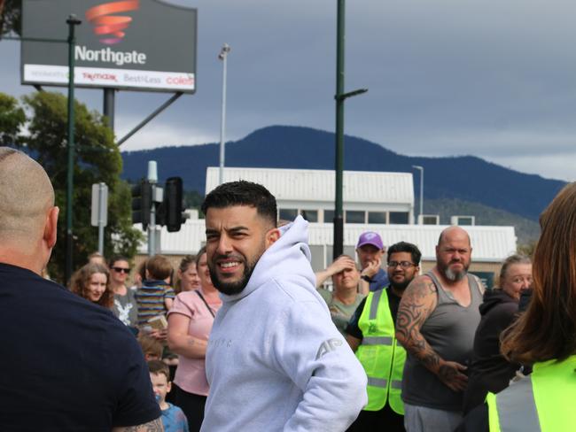 Adrian Portelli walked the length of the line, greeting people before heading inside to get photographs with recipients. Picture: Elise Kaine