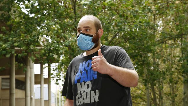 Stephan gives the thumbs up after leaving Sydney Police Centre at Surry Hills. Picture: John Appleyard