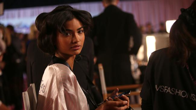 Exotic beauty ... Swedish-Australian model Kelly Gale poses for photographers backstage. Picture: Joel Ryan/Invision/AP