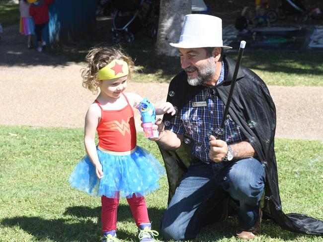 Caterina Loader, 2 and a half, with Cr Luarence Bonaventura at the Mackay Regional Council Book Week Picnic on August 22, 2019.