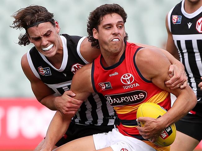 Saturday, 1st April, 2023 - SANFL Showdown. Port Adelaide v Adelaide Crows at the Adelaide Oval. James Borlase of the Adelaide Crows. And Ollie Lord of Port Adelaide Picture: Sarah Reed