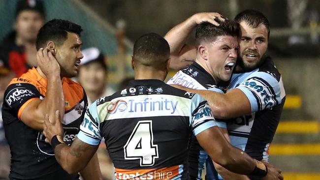 SYDNEY, AUSTRALIA — APRIL 29: Chad Townsend of the Sharks celebrates scoring a try during the round nine NRL match between the Wests Tigers and the Cronulla Sharks at Leichhardt Oval on April 29, 2017 in Sydney, Australia. (Photo by Cameron Spencer/Getty Images)