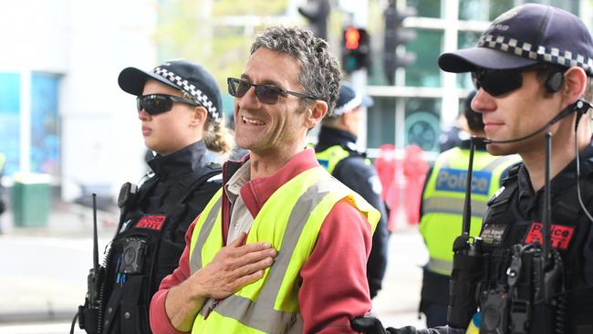 Greens candidate Campbell Gome, running for Northcote in Melbourne’s inner north, being arrested in October 2019 for his Extinction Rebellion protest.