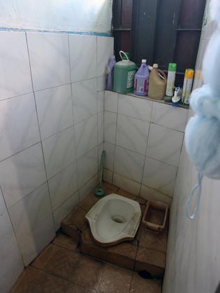 A toilet in a cell at Kerobokan prison, Bali.