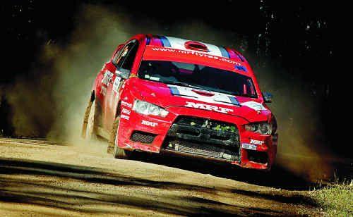 Team MRF’s Gaurav Gill on his way to winning the 2010 International Rally of Queensland at Imbil. Picture: Jeremy Rogers