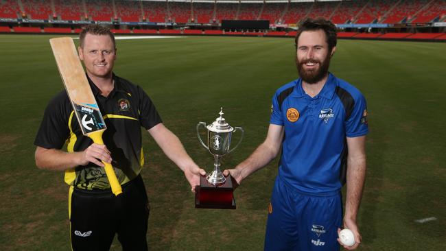 Southport Labrador's Simon Belston and Alberton Ormeau's Corey Galloway with the T20 trophy that they will play for at a revised date. Picture: Glenn Hampson