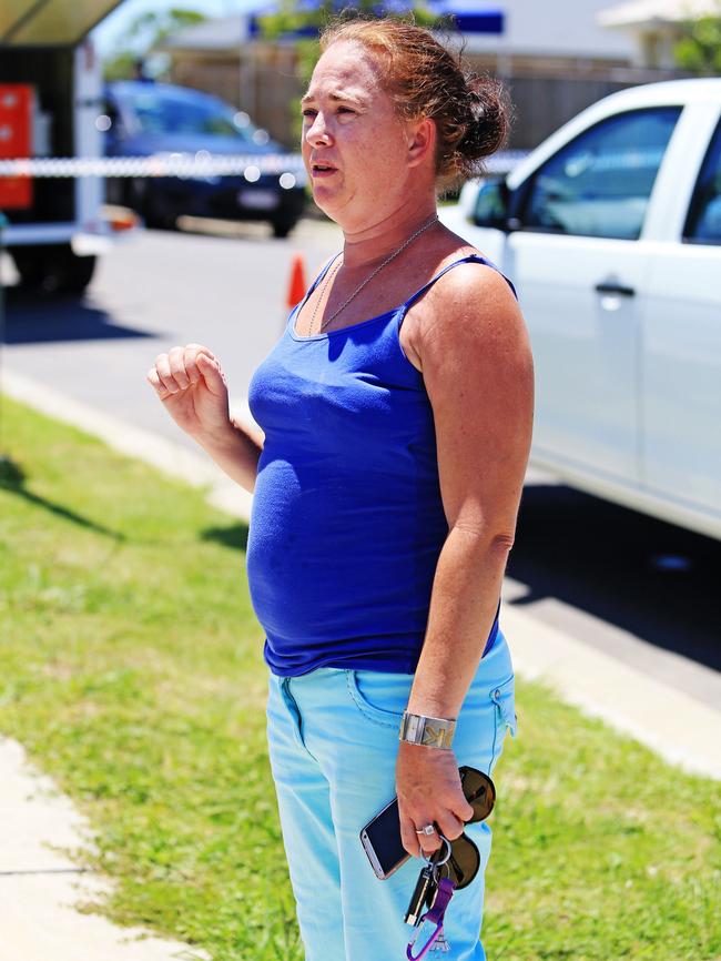 Victim Teresa Bradford’s friend Debra Napper looks on as police work at the crime scene. Picture: Tim Marsden