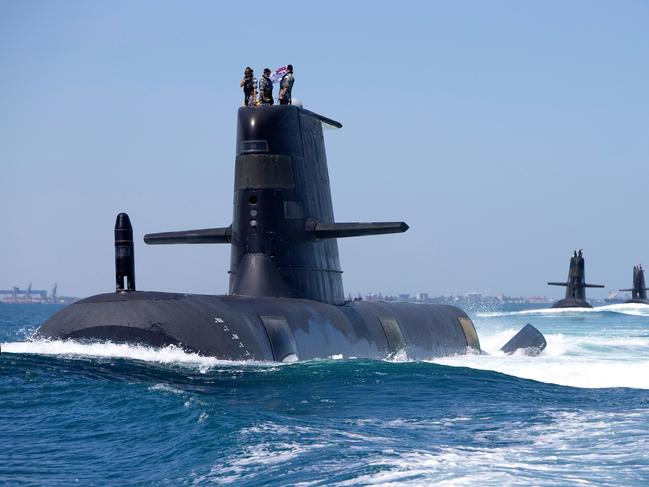 Collins Class Submarines, HMAS Collins, HMAS Farncomb, HMAS Dechaineux and HMAS Sheean in formation while transiting through Cockburn Sound, Western Australia. *** Local Caption *** Royal Australian Navy Collins Class Submarines, HMAS Collins, HMAS Farncomb, HMAS Dechaineux and HMAS Sheean sail in formation while transiting through Cockburn Sound, Western Australia, in February 2019.