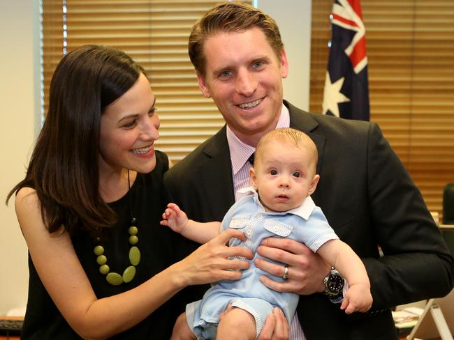 Andrew Hastie, wife Ruth and baby Jonathan in his office at Parliament House in Canberra.