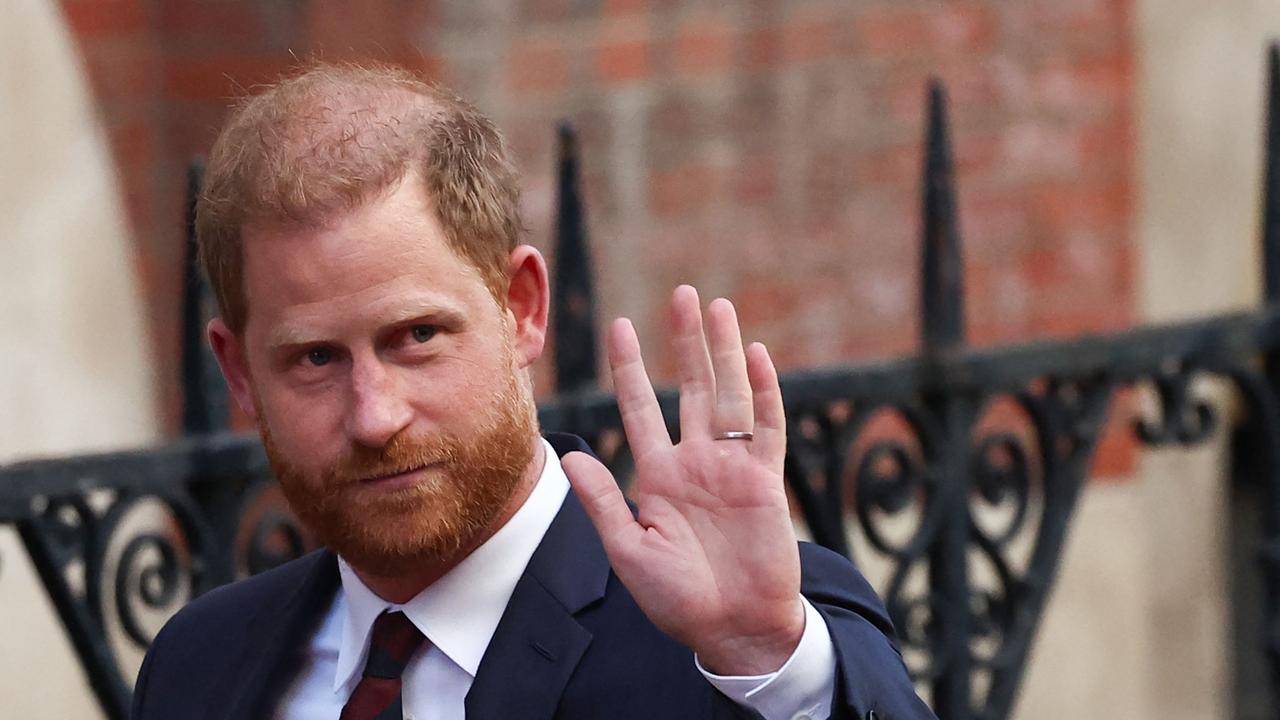 Prince Harry, Duke of Sussex waves as he departs the Royal Courts of Justice, on April 9, 2025. Picture: Henry Nicholls/AFP