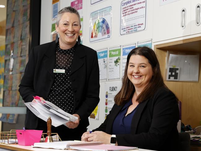 Quakers Hill East Public School Year 6 teacher Laurie Hayhow (right) and school administrative officer Kim Henderson. Kim has been assisting Laurie with administrative tasks for the last few months, freeing her from burdensome paperwork and giving her more time to dedicate to the school's dance troupe. Picture: Jonathan Ng