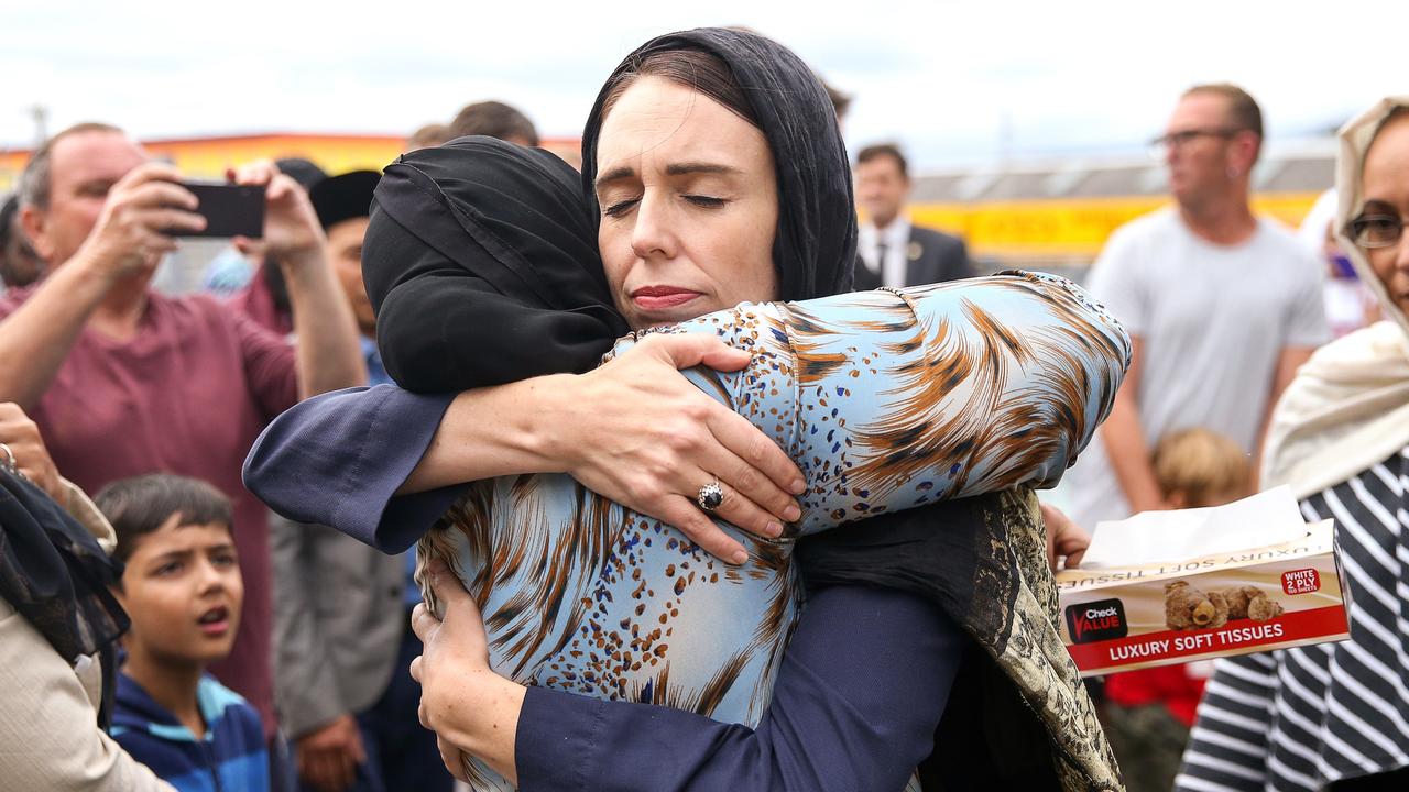 Then-New Zealand Prime Minister Jacinda Ardern hugs a mosque goer at the Kilbirnie Mosque on March 17, 2019, in Wellington, following the terrorist attacks. Picture: Hagen Hopkins/Getty Images.