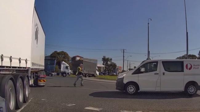 It appears the truck driver failed to give way to the Australia Post driver, causing the road rage incident. Picture: Dash Cam Owners Australia / Facebook