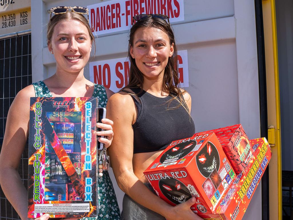 Karla Hobson and Hunter Halkim are stocking up with fireworks ahead of an explosive night of fun on Territory Day. Picture: Pema Tamang Pakhrin