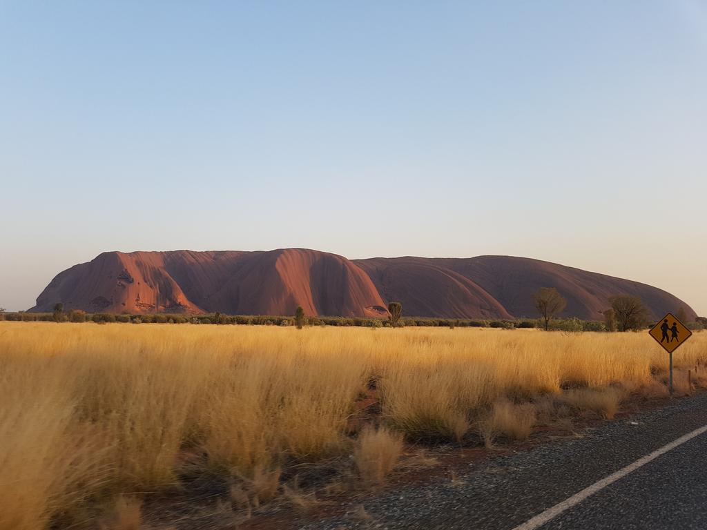 The incident comes as more tourists flock to Uluru to climb the landmark before the ban is put in place. Picture: Charis Chang