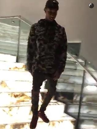 Tyga on Mehajer’s blingin’ staircase. Picture: Instagram