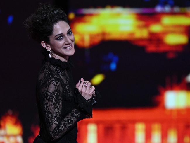 TOPSHOT - Iranian actress Zar Amir-Ebrahimi smiles after she was awarded with the Best Actress Prize for her part in the film 