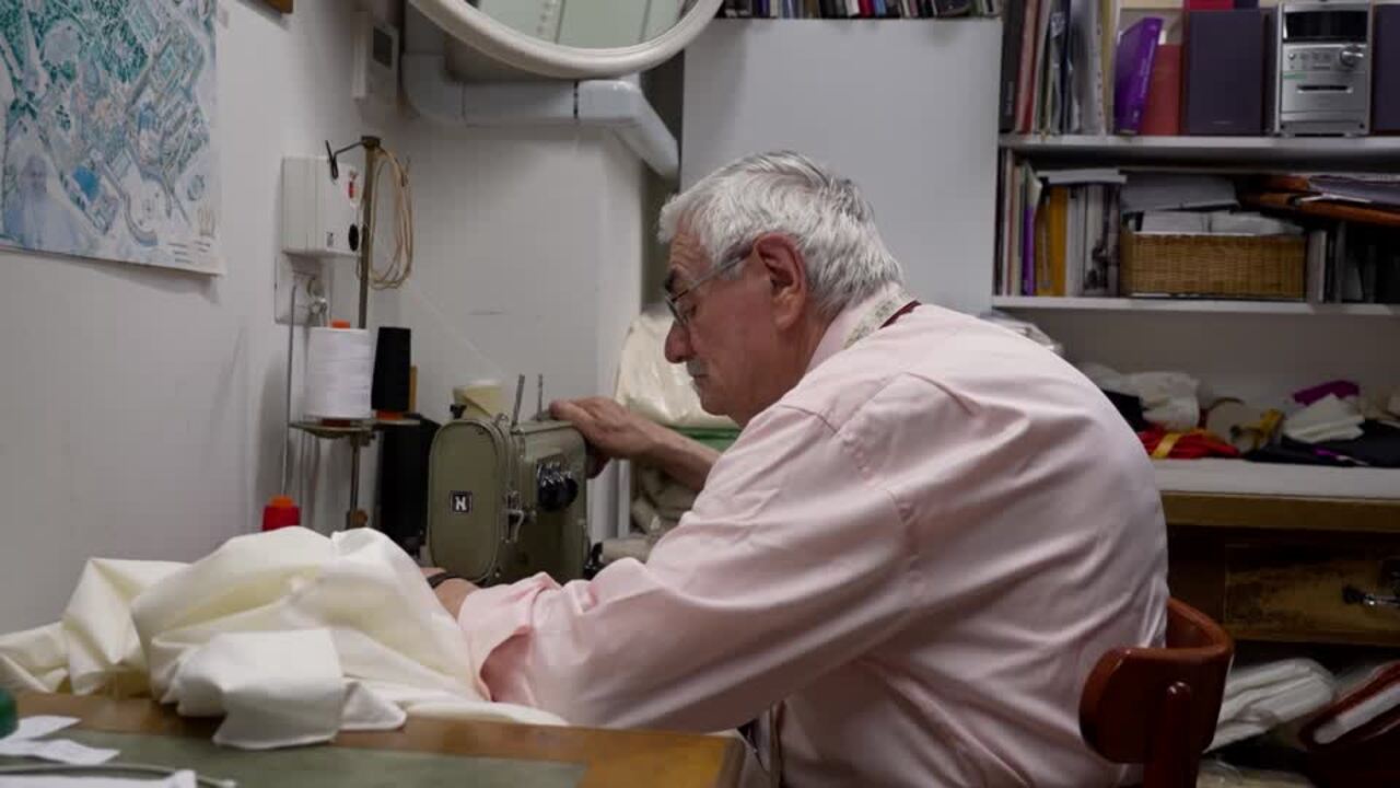 Small, medium or large? Papal tailor keeps his options open