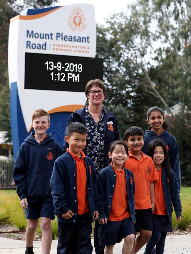 Mount Pleasant Road Primary School principal Kim Streitberger with students Ryan, Samhita, Felix, Tiffany, Rohaan and Haylen.