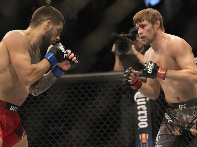 Mitchell’s first UFC loss came to current featherweight champion Ilia Topuria (L). Picture: Louis Grasse/PxImages/Icon Sportswire via Getty Images