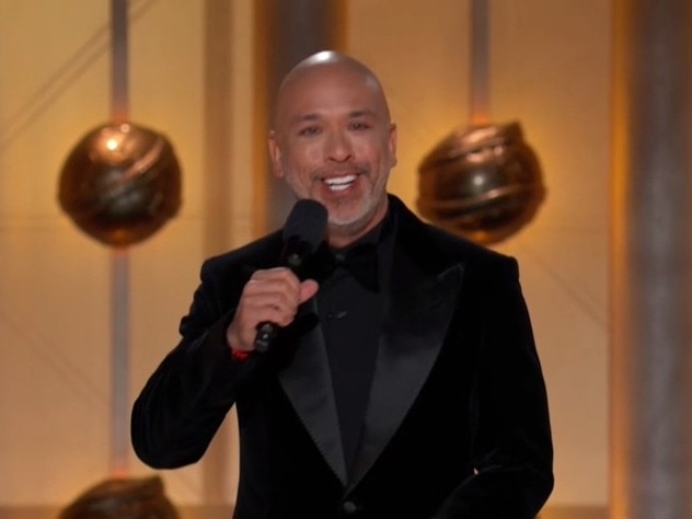 Jo Koy hosting the 2024 Golden Globes ceremony, cracking jokes about Meghan and Harry. Picture: Stan