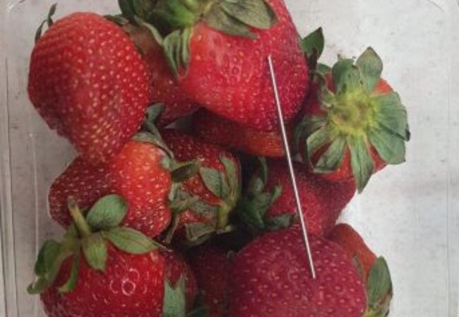 The punnet from Coles Gatton found with a needle on top of the strawberries. Picture: Queensland Police Service