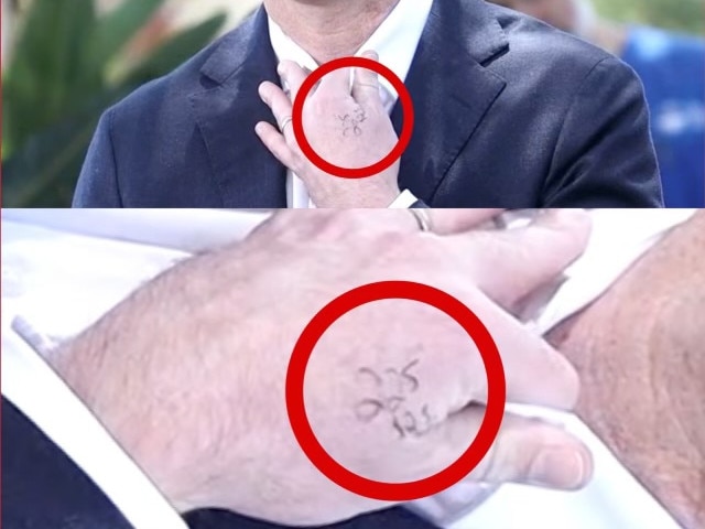 Chris Minns with cheat notes on his hand during the press conference in Sydney.