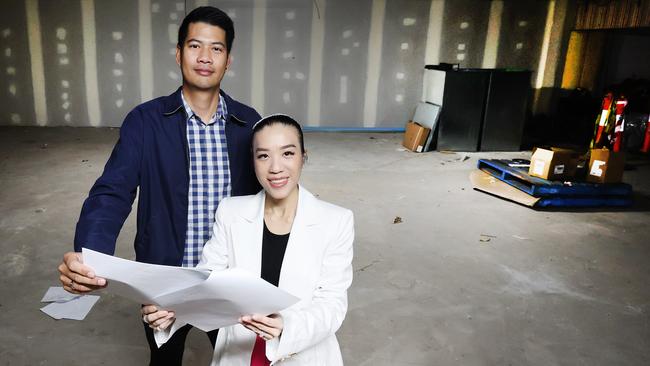 Owners Vitchaya Hasitawet and Pattaree Jiranuchaiwattana check the plans for the new space. Picture: Glenn Hampson
