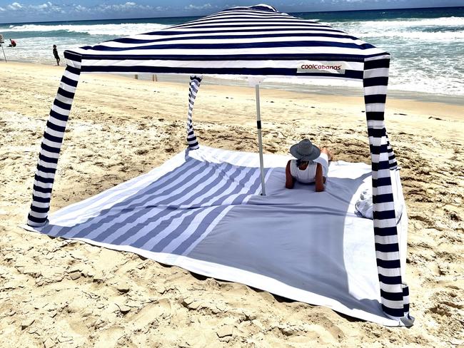 Adam Coward created a mat with a hole in it to be used under a CoolCabana. Picture: Supplied