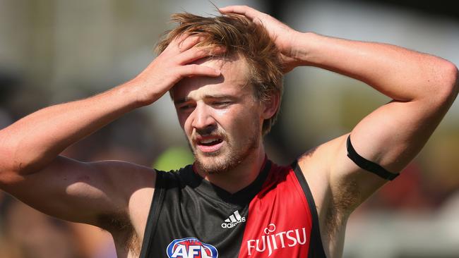 SHEPPARTON, AUSTRALIA - MARCH 05: A distressed Martin Gleeson of the Bombers comes onto the bench during the 2016 AFL NAB Challenge match between the Essendon Bombers and the Geelong Cats at Deakin Resserve on March 5, 2016 in Shepparton, Australia. (Photo by Michael Dodge/Getty Images)