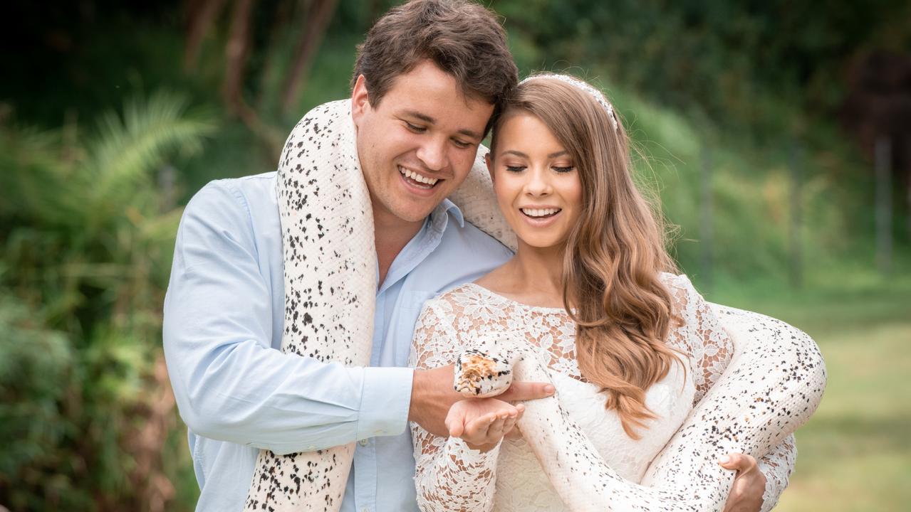 Chandler Powell and Bindi Irwin on their wedding day with a python. Picture: Kate Berry