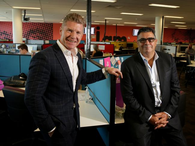 Acquire MD John Wall and chairman Andrew Demetriou at the company's Armadale office, Melbourne.