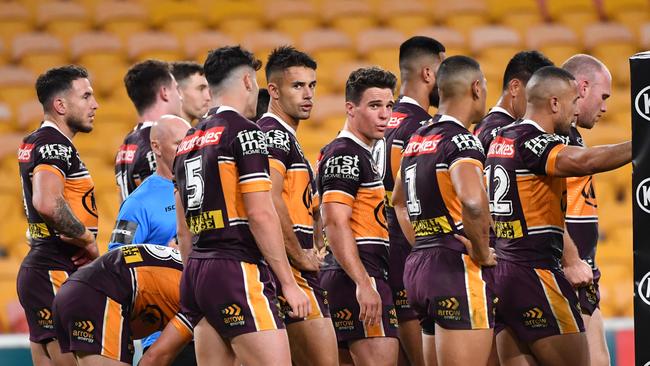 Dejected Brisbane players during their record loss to the Roosters. Picture: AAP/Darren England