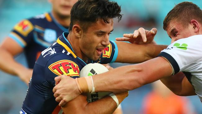 GOLD COAST, AUSTRALIA - JUNE 02: Jesse Arthars of the Titans is tackled during the round 12 NRL match between the Gold Coast Titans and the North Queensland Cowboys at Cbus Super Stadium on June 02, 2019 in Gold Coast, Australia. (Photo by Chris Hyde/Getty Images)