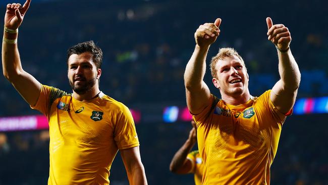 LONDON, ENGLAND - OCTOBER 03: Adam Ashley-Cooper and David Pocock of Australia (R) applaud the fans as they do a lap of honour during the 2015 Rugby World Cup Pool A match between England and Australia at Twickenham Stadium on October 3, 2015 in London, United Kingdom. (Photo by Shaun Botterill/Getty Images)