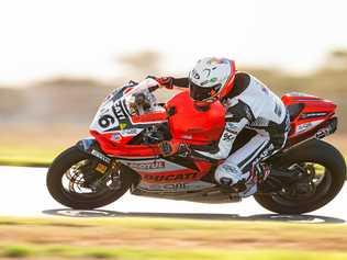 OUT TO WIN: Brisbane boy Mike Jones racing his Desmosport Ducati. Picture: Andrew Gosling