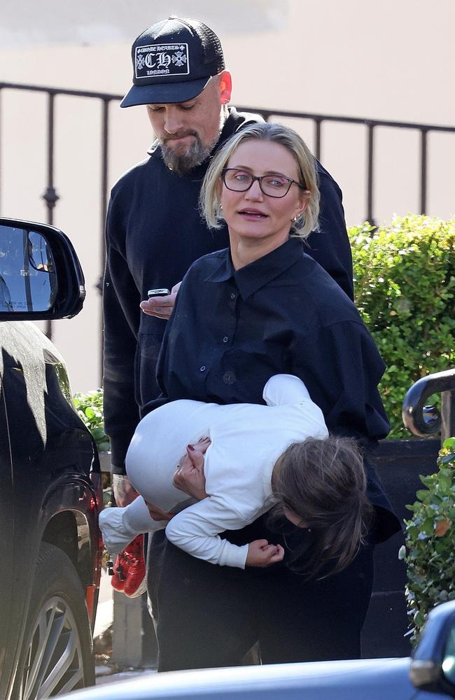 Benji Madden and Cameron Diaz with their three-year-old daughter Raddix in Montecito, California. Picture: BACKGRID