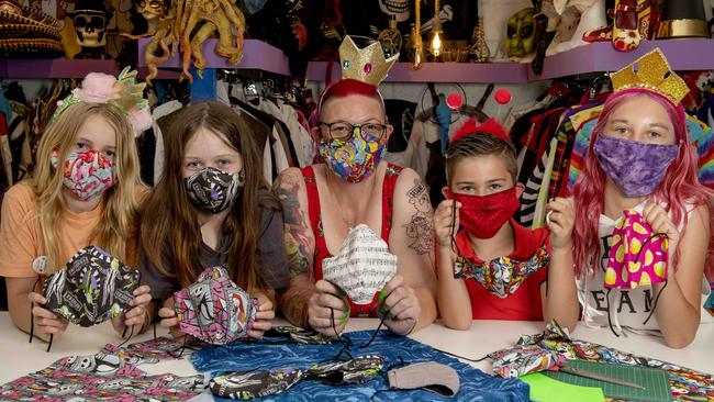 Fancy That On Beach Road in Christies Beach is just one mask manufacturer trying to keep up with the demand families start shopping for back-to-school masks. Co-owner Nicky Bradley (centre) pictured with Lolita, 11, Scarlett, 9, Braxton, 7 and Kayleigh, 10. Picture: Naomi Jellicoe