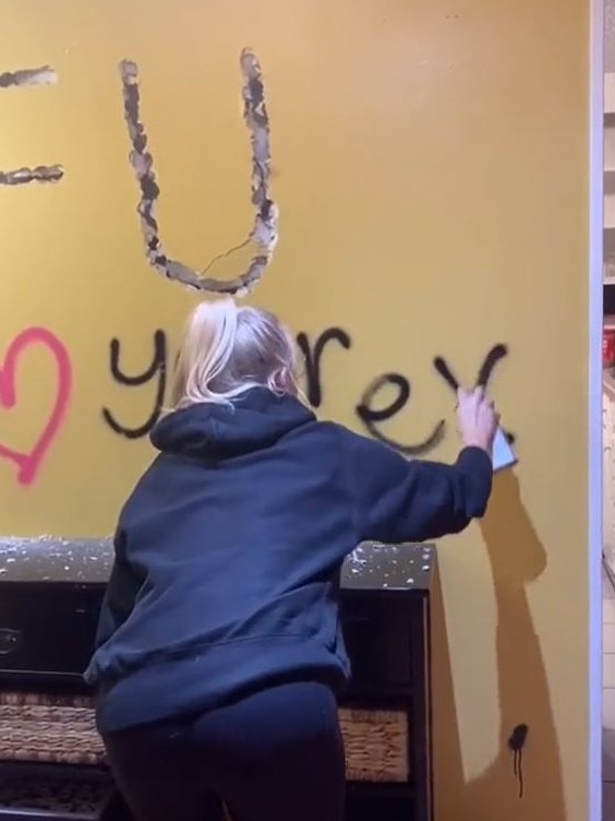 Ashley VanPevenage hammered the message ‘FU’ into a wall in his home. Picture: TikTok/digitalmentorash