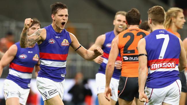 Clay Smith celebrates one of his four goals in the preliminary final