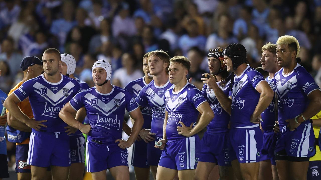 SYDNEY, AUSTRALIA - MARCH 15: Bulldogs players react after a Sharks try during the round two NRL match between Cronulla Sharks and Canterbury Bulldogs at PointsBet Stadium on March 15, 2024, in Sydney, Australia. (Photo by Mark Metcalfe/Getty Images)