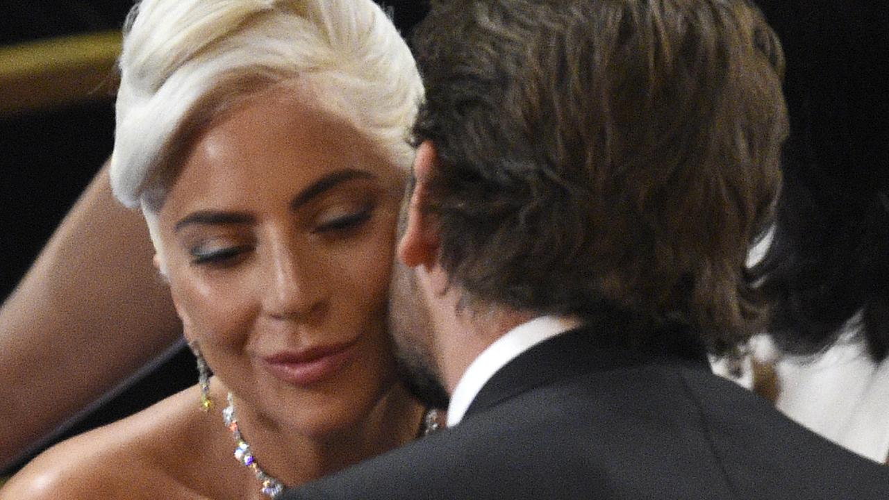 Bradley Cooper, right, congratulates Lady Gaga, winner of the award for best original song for "Shallow" from "A Star Is Born" at the Oscars on Sunday, Feb. 24, 2019, at the Dolby Theatre in Los Angeles. (Photo by Chris Pizzello/Invision/AP)