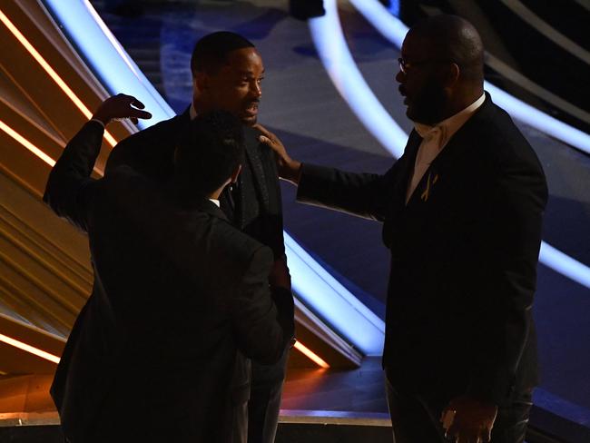 Denzel Washington, Will Smith and Tyler Perry. Picture: AFP