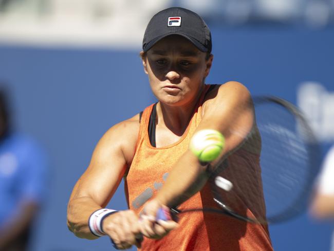 Ashleigh Barty, of Australia, returns the ball as she practices for the U.S. Open tennis tournament Saturday, Aug. 24, 2019, in New York. (AP Photo/Eduardo Munoz Alvarez)