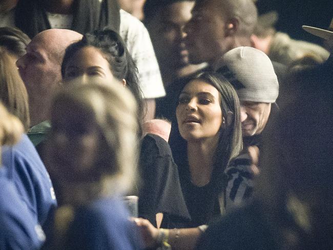 Support ... Kim certainly thinks Kanye is pretty cool ... Picture: Ben Birchall/PA Wire